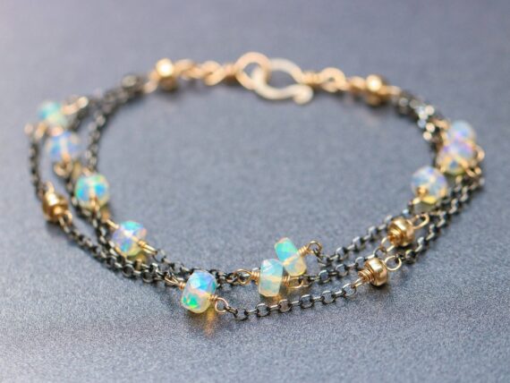 Welo Opal Bracelet with Mixed Metals Gold and Black Silver