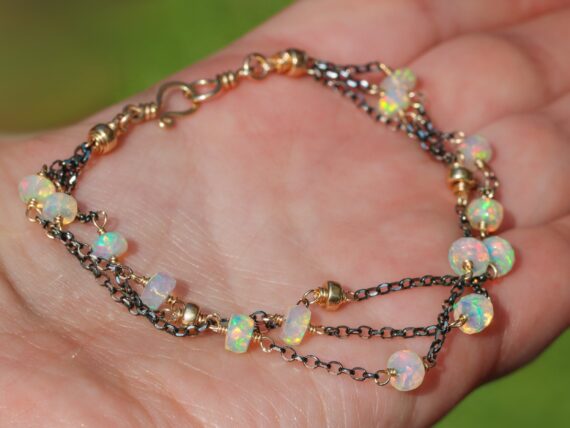 Welo Opal Bracelet with Mixed Metals Gold and Black Silver